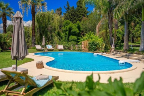 Gaia Residences with lush garden and pool